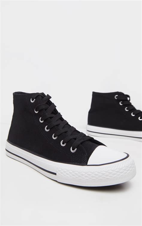 black high top canvas sneakers.